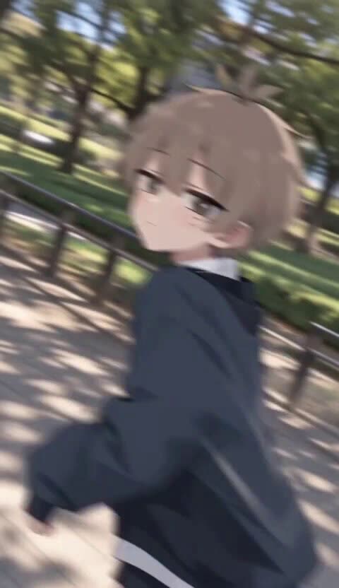Anime boy glancing back while running in park