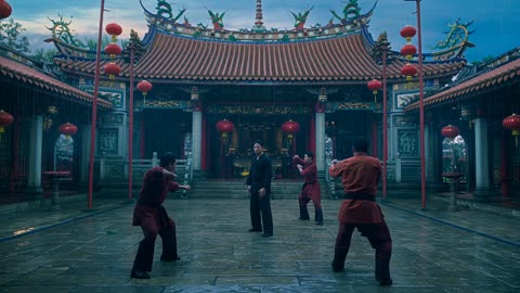 Kung fu duel in a temple courtyard at dusk